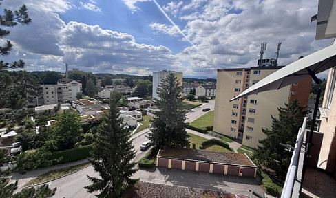 Rented 2-room apartment with panoramic views, elevator, and balcony – an investment property in Traunreut.