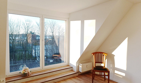Attic apartment with a mezzanine level, 44 square meters, located on Tilsiter Platz in Kiel-Ellerbek.