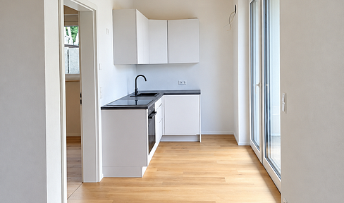 2-Zimmer-Erstbezug im Holzmassivhaus – mit Balkon & hochwertige Ausstattung