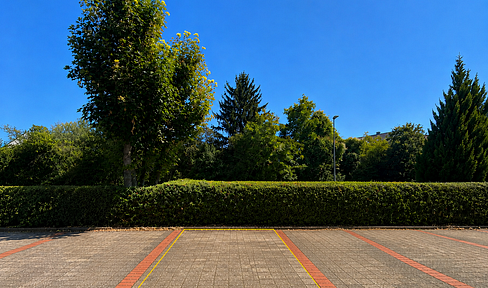 Parking space for rent, located near the train station.