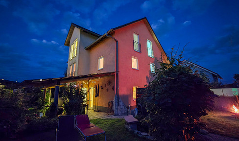 Representative model home with a spacious manager's apartment and a charming garden.
