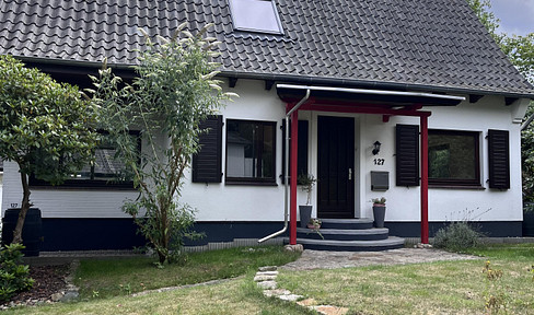 Detached house with a garden.