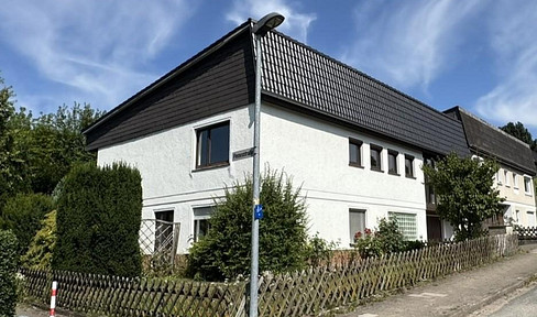 Terraced house with an additional self-contained apartment, located in a family-friendly area.
