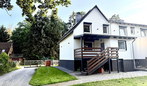 Modern house with a large garden, heat pump, and smart home technology in Bissendorf-Wietze.