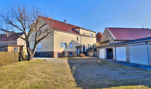 2 residential buildings plus 3 garages in Storbeck.