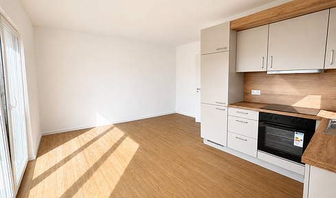 First occupancy in a new building! Modern 2-room apartment with QNG-Plus certification and fitted kitchen!
