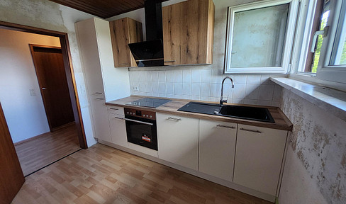 Sonnige 3-Zimmer-Wohnung mit EBK, Balkon, Keller, Garage und Stellplatz