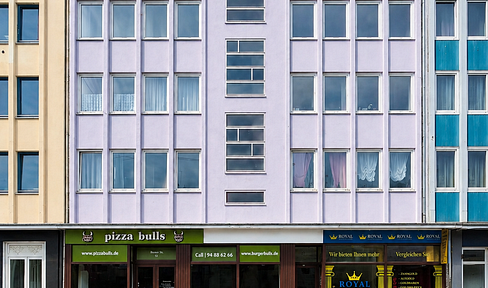 Fully occupied residential and commercial building in St. Johann, Saarbrücken.