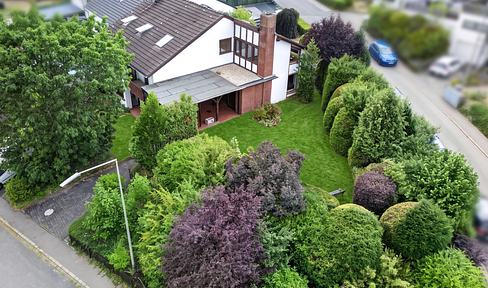 Großzügiges Wohnen mit schönem Garten – Einfamilienhaus mit Einliegerwohnung