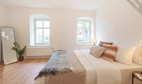Beautiful 4-room apartment with a terrace, garden, and parking space.