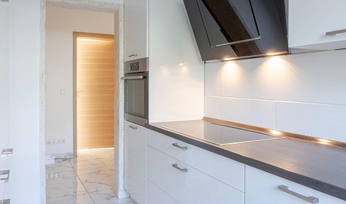 Wie neu: Modernisierte 3-Zimmer-Wohnung mit hochwertiger Küche in ruhiger Lage.
