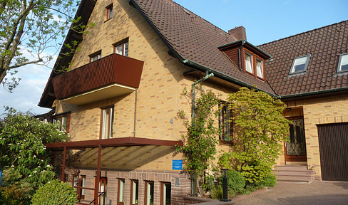 High-quality, well-maintained house with character, featuring two living units, for sale.