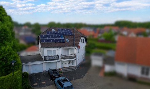 Exceptional 2-room attic apartment with fireplace, en-suite bathroom, balcony, and finished attic space.