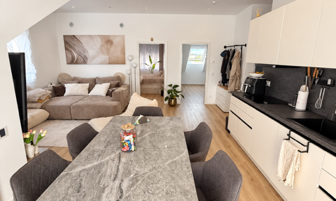 Modern 2-room penthouse apartment (energy efficiency rating A+) with underground parking space – no commission fees.