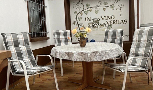 Well-maintained single-family house with a stairlift.