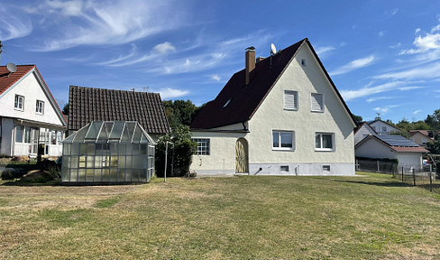 Detached single-family house with a large plot and great potential, located in Kühbach.
