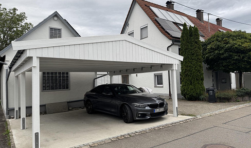 Completely renovated family home with a stunning conservatory, solar panels, a heat pump, and a large outbuilding.