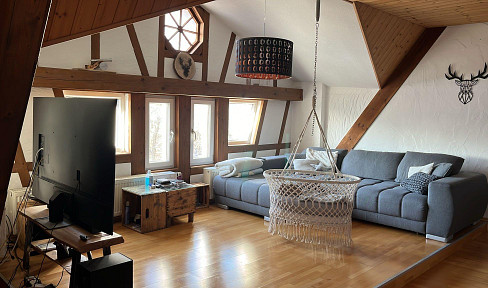 Spacious 3.5-room apartment with a balcony, garden, and parking space.