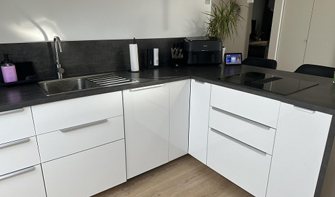 KfW 55 Plus new construction: Bright 2-room attic apartment with balcony in Mittenwalde.