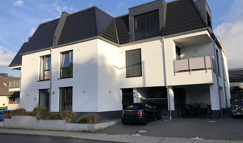 Family-friendly, modern apartment with a terrace and parking space.