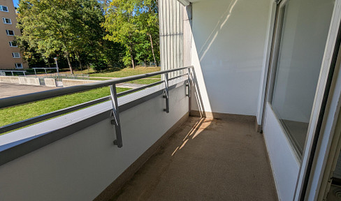 Bright, one-bedroom apartment with a balcony and parking space.