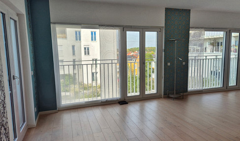 Bright, spacious living space with stunning views over the rooftops of Karlsfeld: MAN/MTU 2 bus stations.