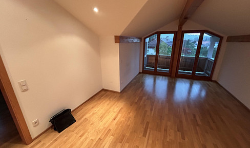 Modern 2-room attic apartment with a balcony and fitted kitchen in Neubeuern.