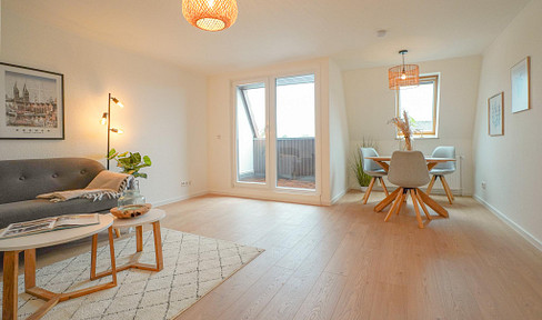 Modernisierte 2-Zimmer-Dachgeschosswohnung mit Balkon in zentraler Lage - ideal für Eigennutzer