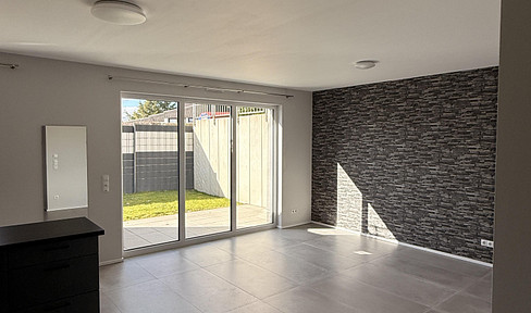 Modern 65m² apartment with a terrace and a share of the garden.
