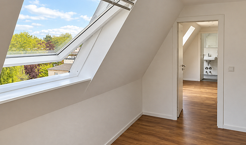 Apartment in the attic, built without proper permits, but currently generating rental income.