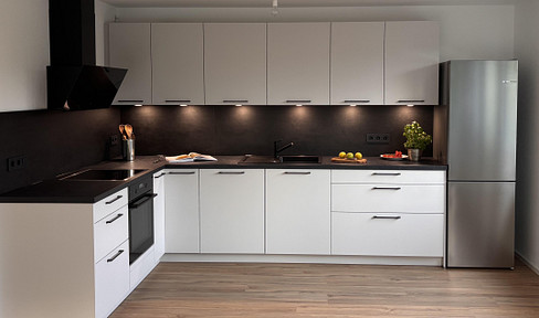 Helle 2-Zimmer-Neubau-Wohnung mit Küche, Balkon und 2 Stellplätzen in Nürtingen-Oberensingen