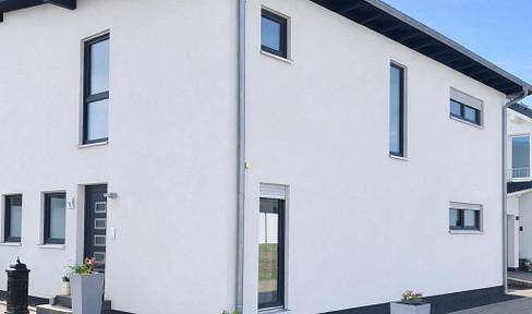 Hochwertiges Einfamilienhaus (A+) mit Erdwärme, großer Terrasse & Doppelgarage – provisionsfrei