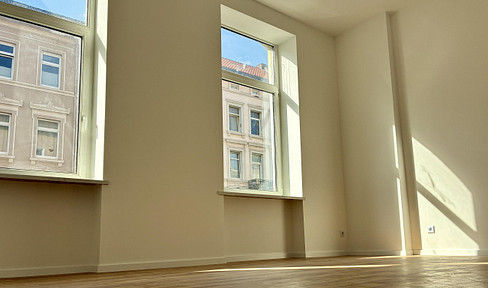 Room for rent in a newly renovated apartment shared by five people.