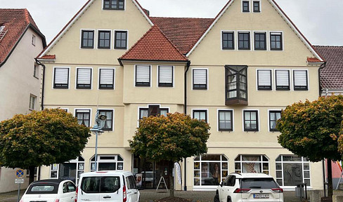 Bright attic apartment with a market square view – centrally located in Bad Buchau.