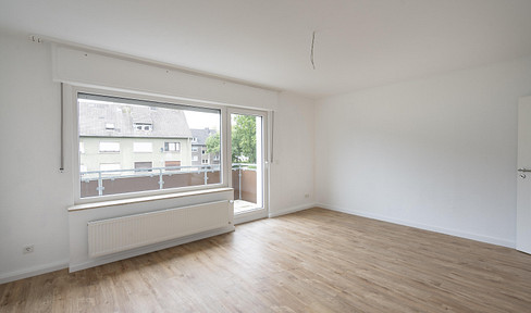 Modernized 4-room apartment (85m²) with balcony & new fitted kitchen – near the town hall in Datteln.