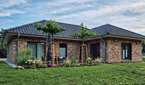 Erstklassiger Neubau Winkelbungalow Barrierefrei inklusiv PV-Anlage