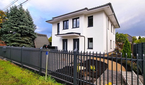 Erstbezug im Grünen: Exklusive 3,5-Zi.-Wohnung mit Premium-EBK & privatem Garten
