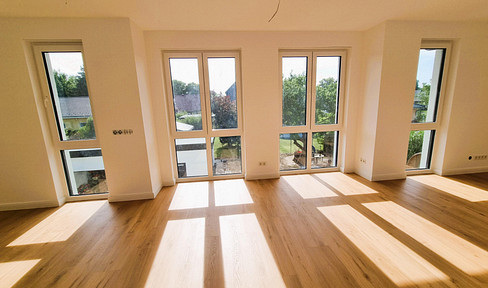 Erstbezug im Grünen: Exklusive 3,5-Zi.-Wohnung mit Premium-EBK & privatem Garten