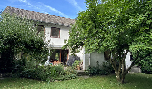 Oase in der Stadt – Einfamilienhaus mit Parkblick