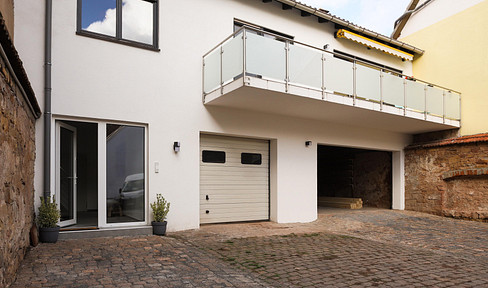 Renovated single-family home with 2 large garages and countless possibilities for customization (IC04).