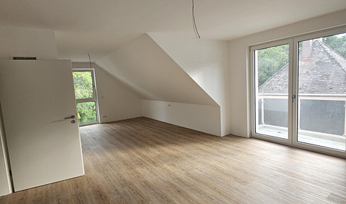 Erstbezug DG Wohnung im neuen 8-Familienhaus nach KFW 40 Standard
