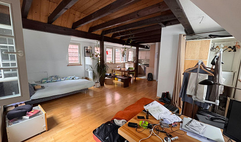 Apartment in the attic of a building, located in a picturesque old town.