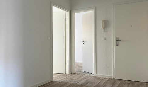 Erstbezug nach Sanierung – moderne 4-Zimmer-Wohnung mit Balkon und Blick ins Grüne