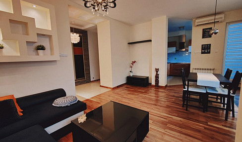Arrive and feel at home: Top 2-room apartment with approximately 58 square meters, featuring a balcony and a fitted kitchen.