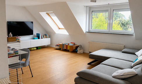 Live like you're in a house: This modernised maisonette apartment, spread over two levels, features a rooftop terrace and includes a garage.