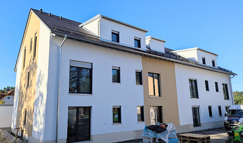 4-room apartment in a new building on the ground floor, available for the first time, with a terrace and garden, fitted kitchen, and a parking space in the underground garage with a charging station.