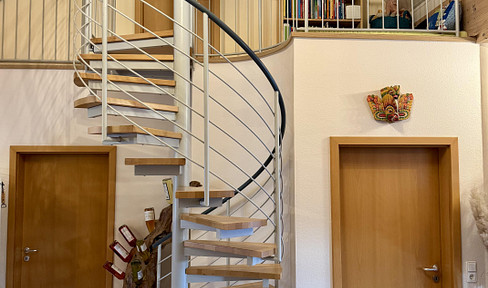Unique gallery apartment with a south-facing balcony and unobstructed views of the Bibertal valley.