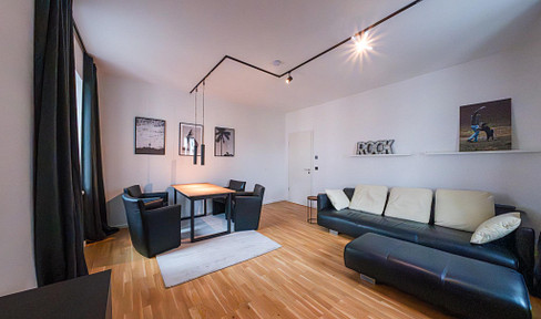 Modern 4-room apartment with a balcony, elevator, and underground parking in Berlin-Johannisthal.