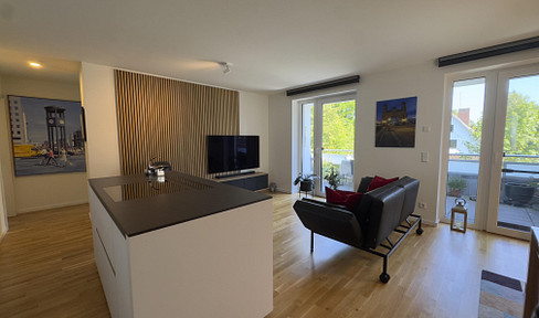 Penthouse im Staffelgeschoss mit großzügigem Wohnbereich, Balkon und hochwertiger Ausstattung