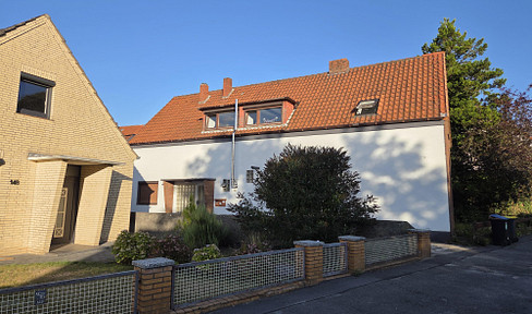 Erdgeschosswohnung mit großer Terrasse im Dreiparteienhaus in Rönnebeck